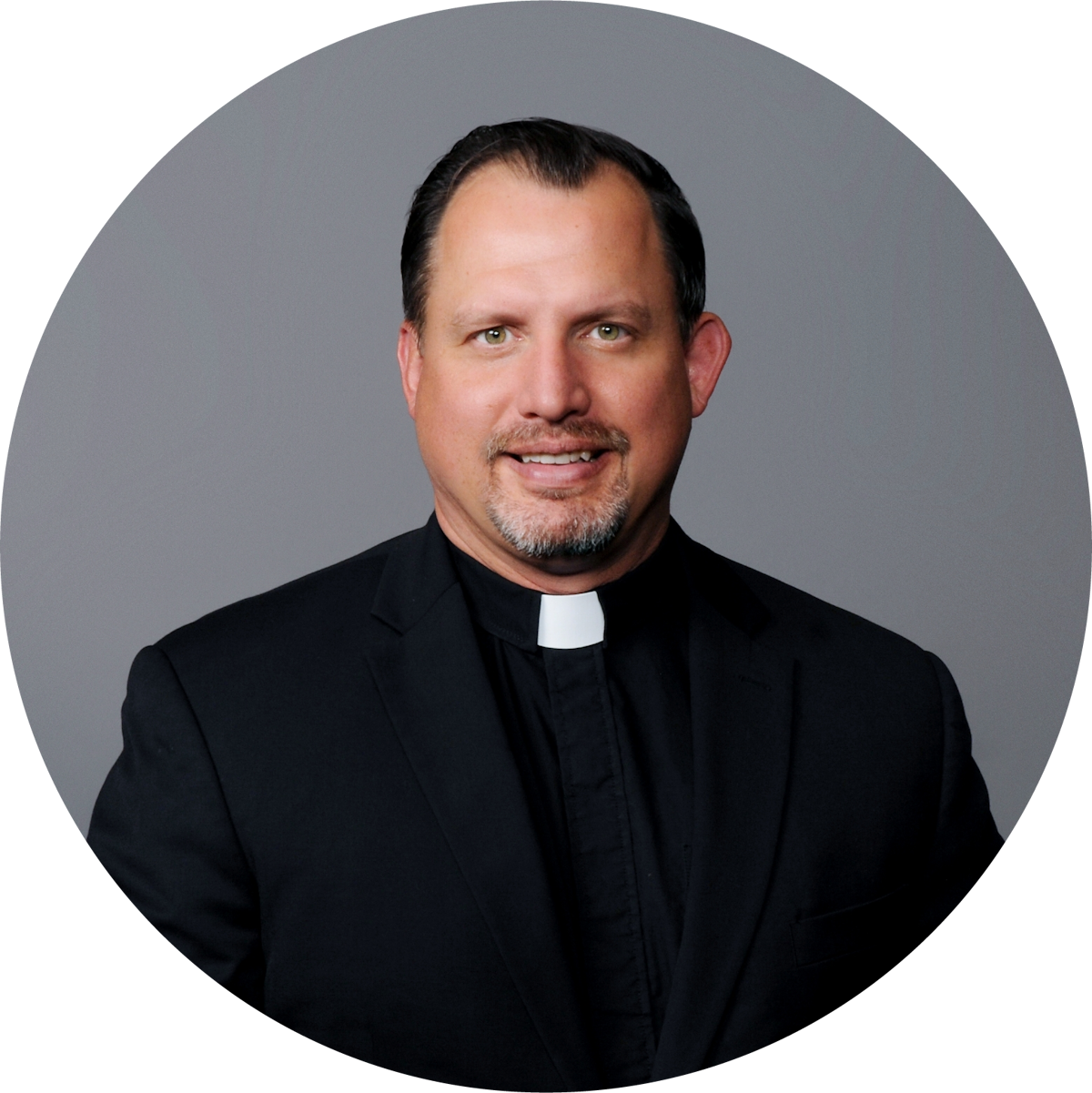 pastor-christopher-jackson-circle-transparent-background male pastor in a black clerical collar